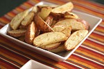 Фото рецепта: Жаренные картофельные ломтики