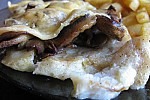 Фото рецепта: Рыба, запеченная с грибами и сыром