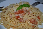 Фото рецепта: Спагетти с тунцом и помидорами