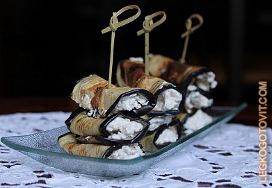 Фото рецепта: Баклажаны с сыром и грецкими орехами