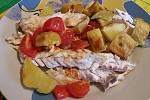 Как приготовить Морской окунь с помидорами и картофелем