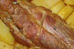 Фото рецепта: Свиная вырезка запеченная в духовке с картофелем