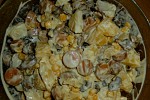 Фото рецепта: Салат из отварного картофеля, грибов, сосисок и кукурузы