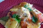 Фото рецепта: Треска с картофелем и помидорами